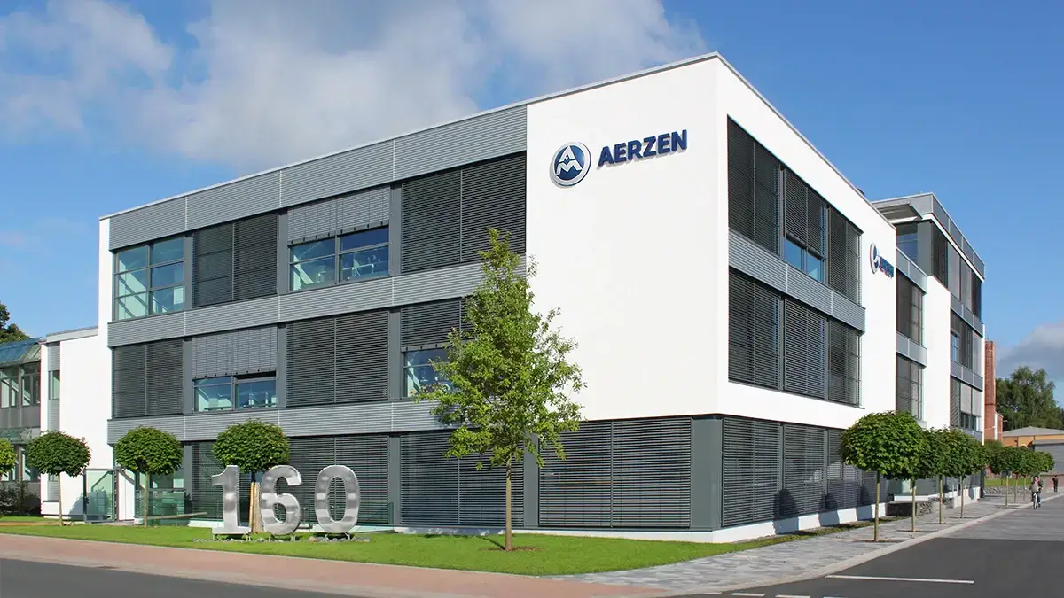 AERZEN main office building with 160th anniversary sign in front